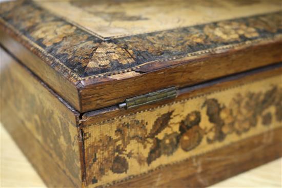 A Tunbridge ware box, a pair monopodia bronze candlesticks and a sun dial box length 23.4cm